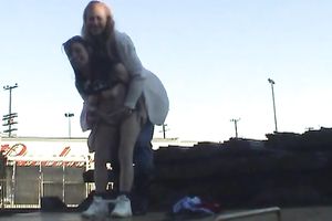 Two skanky older lesbian babes show off their goodies outdoors