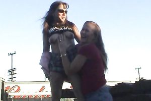 Two skanky older lesbian babes show off their goodies outdoors