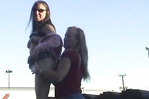 Two skanky older lesbian babes show off their goodies outdoors