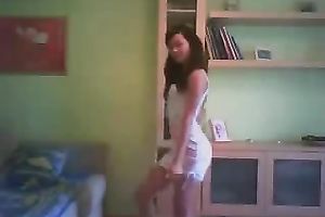 Svelte black haired livecam floozy in taut white costume was dancing on cam