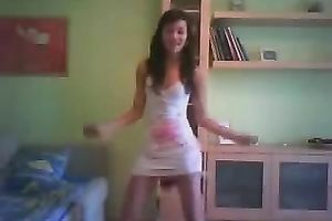 Svelte black haired livecam floozy in taut white costume was dancing on cam