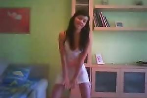 Svelte black haired livecam floozy in taut white costume was dancing on cam