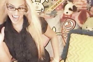 Mature blondie with gigantic tits flaunts 'em on web camera