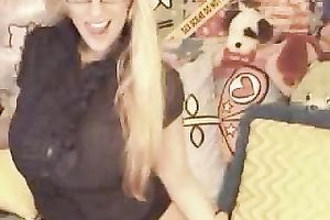 Mature blondie with gigantic tits flaunts 'em on web camera