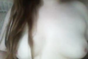 Red haired legal age teenager playing with her milk shakes sensually