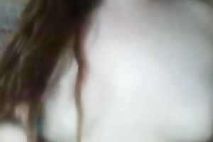 Red haired legal age teenager playing with her milk shakes sensually