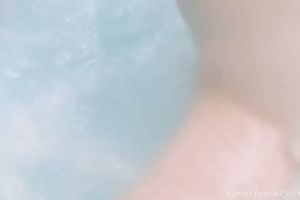 Tattooed babe has a baths and masturbates