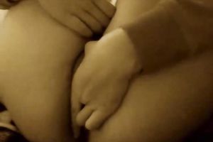 Cute and breasty white girl on her daybed fingering herself