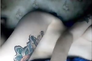 Tattooed pallid chick with natural titties was lying and fingering her vagina