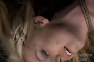 Slim blond enjoys toying and whipping in a basement