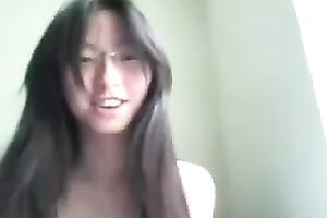 My nerdy Asian girlfriend masturbating her bald cunt on a web camera