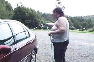 Mature bbw hotwife of mine washes my car flashing her large saggy breasts