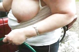 Mature bbw hotwife of mine washes my car flashing her large saggy breasts