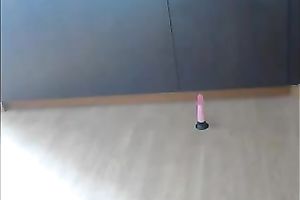 Long haired dilettante GF of mine squats down to fuck with toy