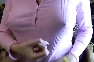 The teats of this breasty milfie push throughout her shirt