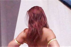 Mega sexy redhead juvenile honey showing off her body outside