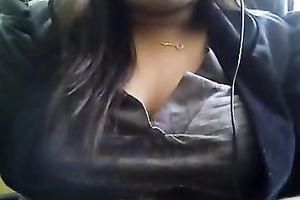 Bored serious looking web camera fatso rubs her puffy teats and milk cans