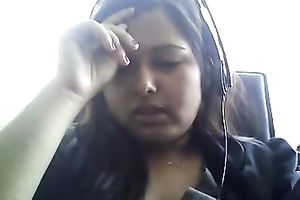Bored serious looking web camera fatso rubs her puffy teats and milk cans