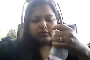 Bored serious looking web camera fatso rubs her puffy teats and milk cans