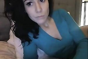 Dark-haired femdom-goddess with charming eyes is cumming for me on livecam