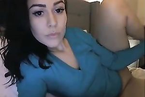 Dark-haired femdom-goddess with charming eyes is cumming for me on livecam