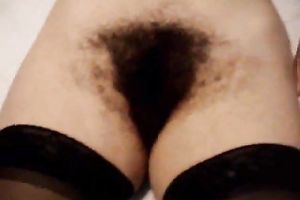 Amateur dark haired masked nympho was flashing her truly bushy snatch