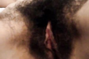 Amateur dark haired masked nympho was flashing her truly bushy snatch