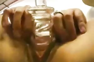 Damn voracious black haired nympho screwed her own wet crack with glass marital-device