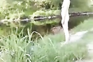 My miniature pale skin sweetheart by the river outdoors all bare