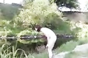 My miniature pale skin sweetheart by the river outdoors all bare