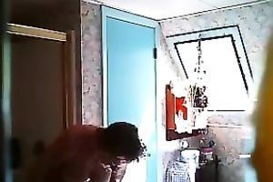 Hidden camera movie scene of my mother-in-law drying her giant breasts
