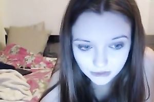 Adorable legal age teenager pleasing her constricted pink muff with sex toy