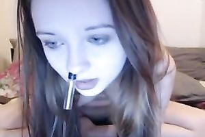 Adorable legal age teenager pleasing her constricted pink muff with sex toy