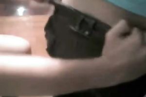 Petite girlfriend in front of webcam shows boobs and tries to play with a jock