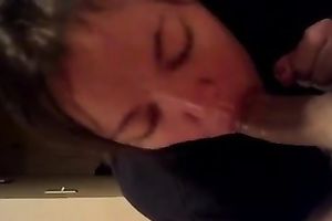 My cute dilettante girlfriend fully dressed blowing my dick