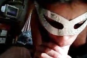 Masked cock sucker attacks my knob with her throat