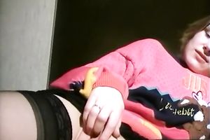 Naughty white curvy golden-haired lady flashes her cunt on the sofa