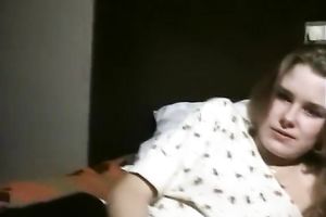 Naughty white curvy golden-haired lady flashes her cunt on the sofa