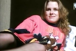 Naughty white curvy golden-haired lady flashes her cunt on the sofa