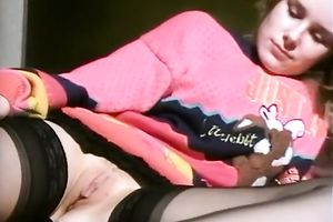 Naughty white curvy golden-haired lady flashes her cunt on the sofa