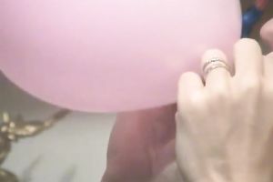 Nasty pigtailed floozy blows balloons totally nude