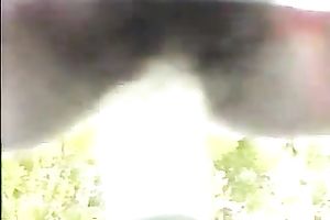 Curvy girl takes a sunbath and bonks herself with sex toy on my car