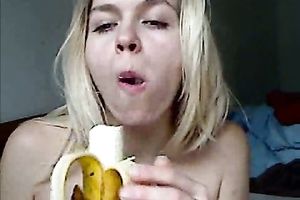 Hot golden-haired livecam sweetheart temptingly eat banana topless