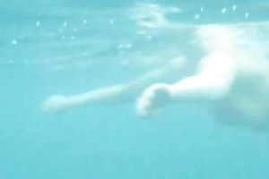 My charming slutwife swims underwater and her arse muscles work