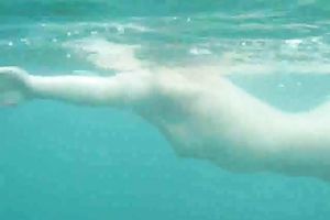 My charming slutwife swims underwater and her arse muscles work