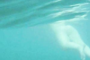 My charming slutwife swims underwater and her arse muscles work