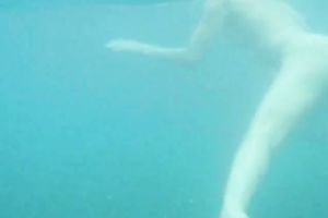 My charming slutwife swims underwater and her arse muscles work