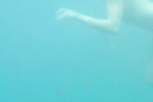 My charming slutwife swims underwater and her arse muscles work