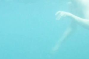 My charming slutwife swims underwater and her arse muscles work