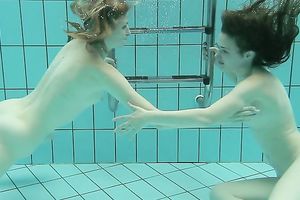 Two cute white hawt college cuties from Russian Federation below water